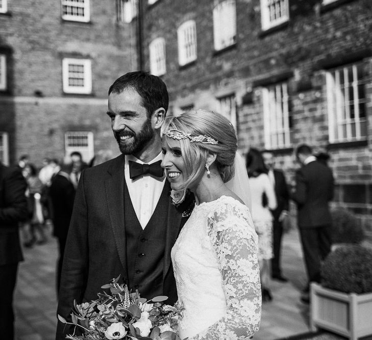 Bride in Charlie Brear Torum Dress & Adrianna Lace Jacket | Groom in Bespoke Michelsberg Tailoring Suit & Bow Tie | S6 Photography