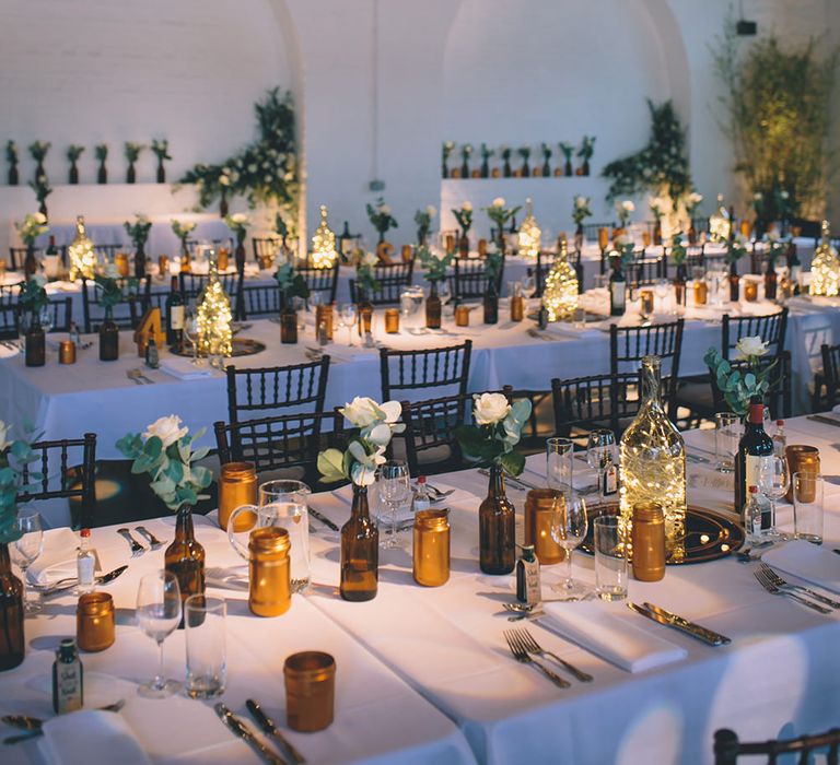 Table Setting with Brown Bottles & Gold Spray Painted Jars