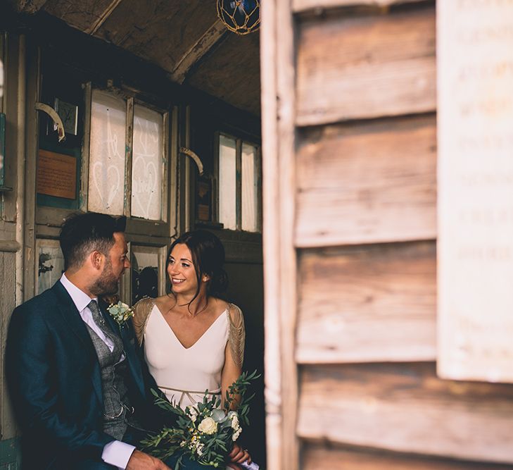 Bride in Luella's Bridal Boutique Nuria Gown & Groom in Jack Bunneys Suit