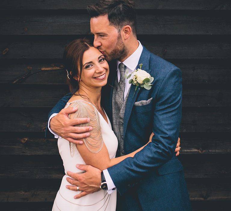 Bride in Luella's Bridal Boutique Nuria Gown & Groom in Jack Bunneys Suit