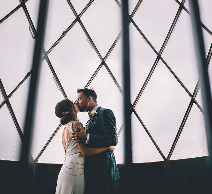 Bride in Luella's Bridal Boutique Nuria Gown & Groom in Jack Bunneys Suit