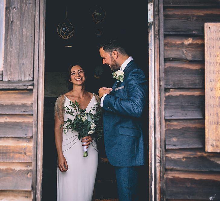 Bride in Luella's Bridal Boutique Nuria Gown & Groom in Jack Bunneys Suit