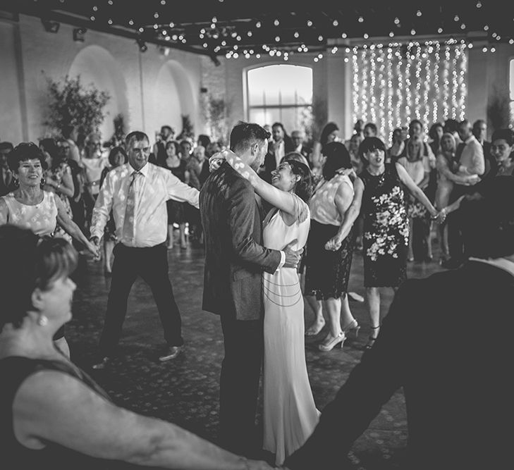 Bride in Luella's Bridal Boutique Nuria Gown & Groom in Jack Bunneys Suit