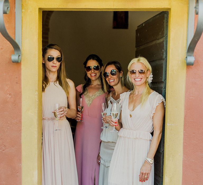 Bridesmaids in Different Blush Dresses | Intimate Destination, Family Wedding Planned by The Knot in Italy Weddings at Castello Il Palagio , Italy | Linda Nari Photography