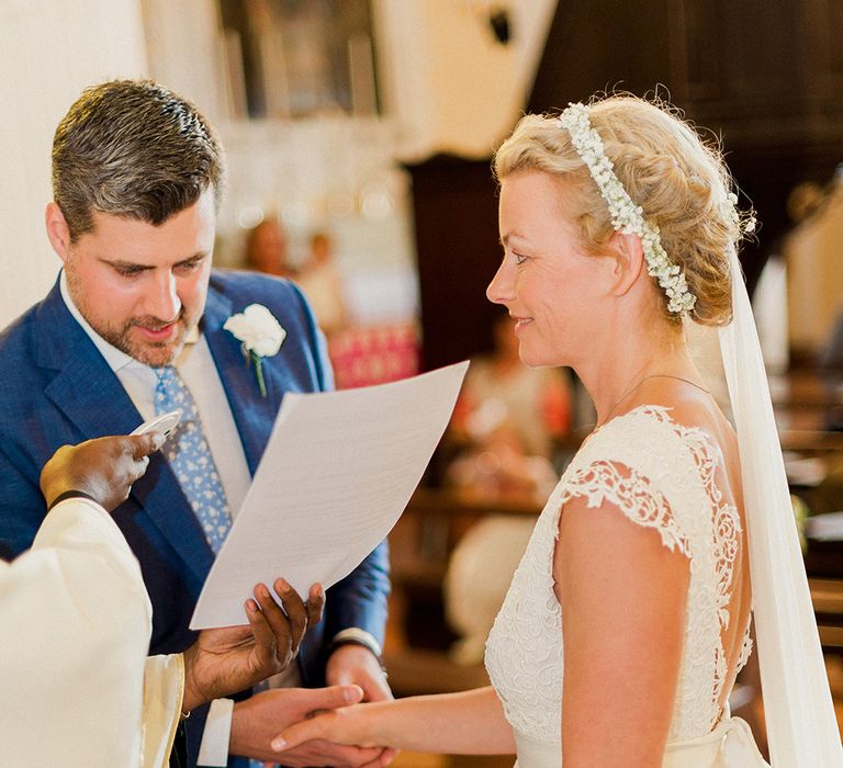 Wedding Ceremony | Bride in Monique L'Huillier Skirt, Bridal Separates | Groom in Light Blue Baldessarini Suit | Linda Nari Photography