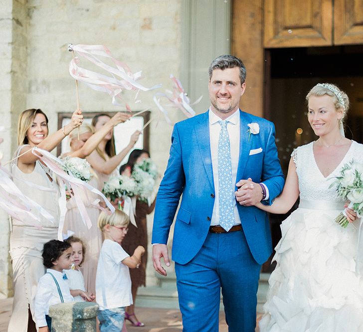 Bride in Monique L'Huillier Skirt, Bridal Separates Groom in Light Blue Baldessarini Suit | Linda Nari Photography