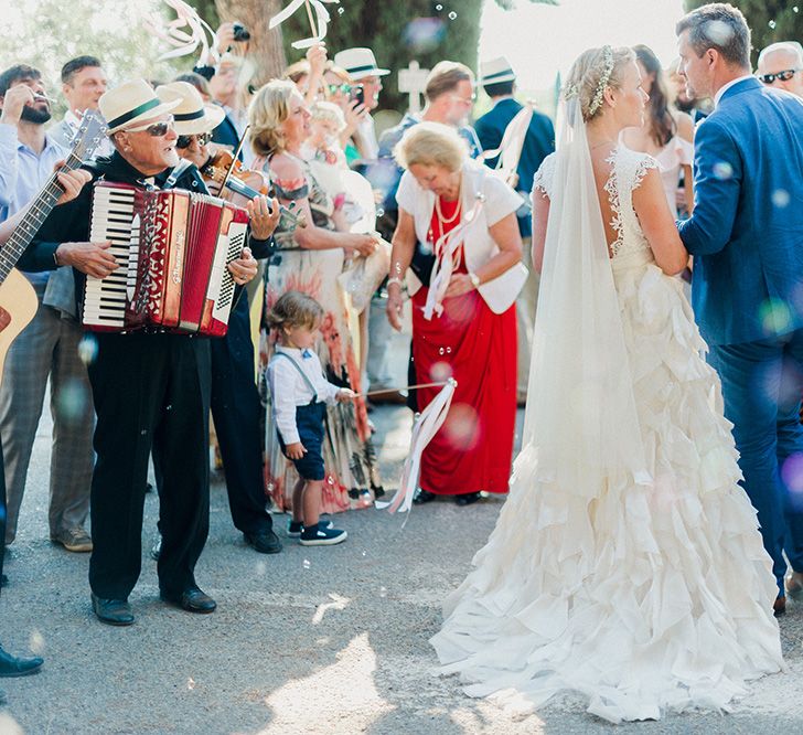 Bride in Monique L'Huillier Skirt, Bridal Separates | Groom in Light Blue Baldessarini Suit | Linda Nari Photography