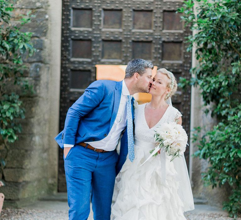 Bride in Monique L'Huillier Skirt, Bridal Separates | Groom in Light Blue Baldessarini Suit | Linda Nari Photography