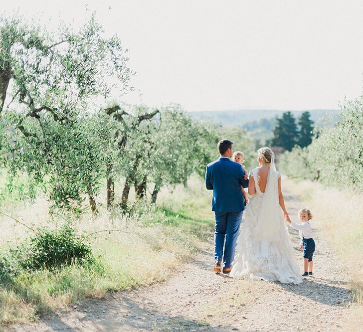 Bride in Monique L'Huillier Skirt, Bridal Separates Groom in Light Blue Baldessarini Suit | Linda Nari Photography