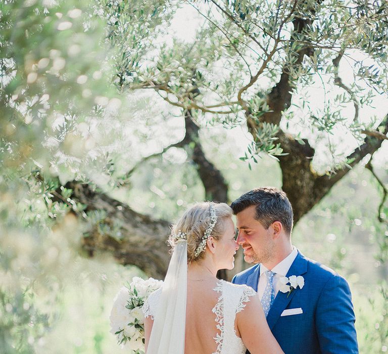 Bride in Monique L'Huillier Skirt, Bridal Separates Groom in Light Blue Baldessarini Suit | Linda Nari Photography