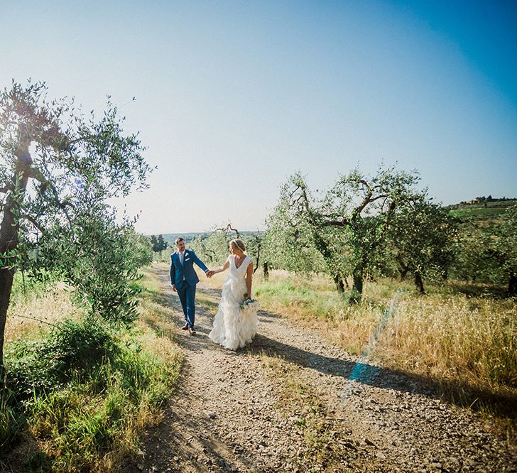 Bride in Monique L'Huillier Skirt, Bridal Separates Groom in Light Blue Baldessarini Suit | Linda Nari Photography