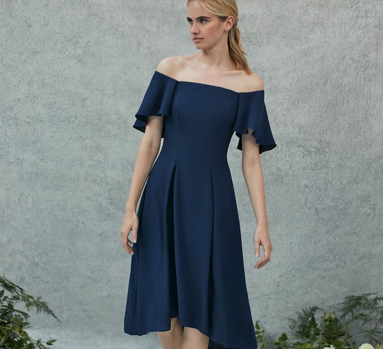 <a href="https://www.coast-stores.com/p/betty-midi-dress/1911920?utm_source=Rock_my_wedding&utm_medium=social&utm_campaign=blog_post&utm_content=bettydress" rel="noopener" target="_blank">Betty Midi Dress</a> by Coast