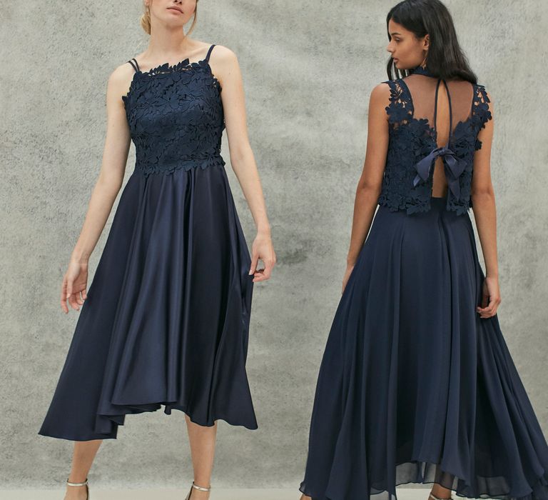 <a href="https://www.coast-stores.com/p/janie-lace-midi-dress/1875120?utm_source=Rock_my_wedding&utm_medium=social&utm_campaign=blog_post&utm_content=janie2" rel="noopener" target="_blank">Jani Lace Midi Dress</a> by Coast