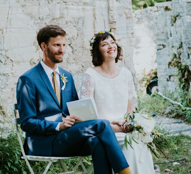 Boho Bride in Bespoke Lace Bridal Separates | Groom in Blue Suit | Chic Rustic French Wedding at Le Morimont Styled by Féelicité | Photography by Chloe