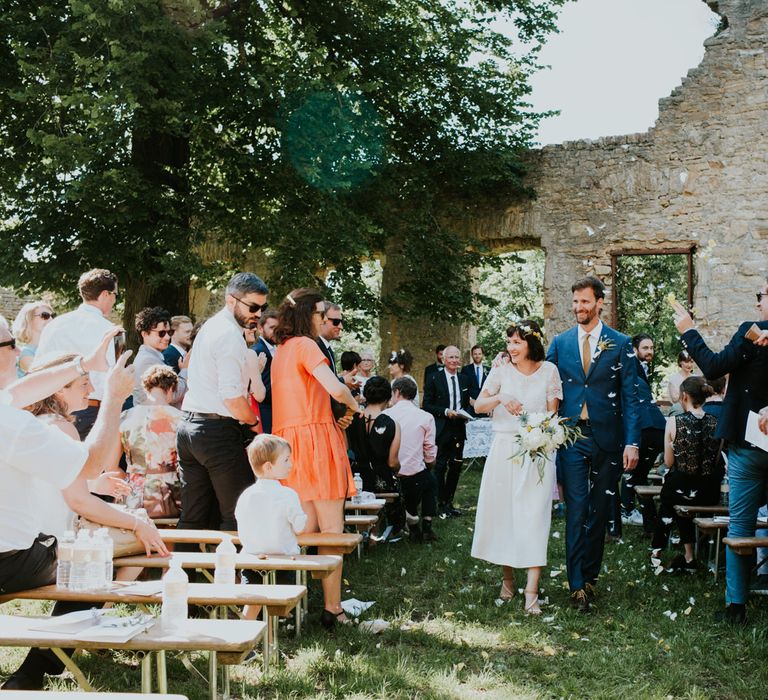 Boho Bride in Bespoke Lace Bridal Separates | Groom in Blue Suit | Chic Rustic French Wedding at Le Morimont Styled by Féelicité | Photography by Chloe