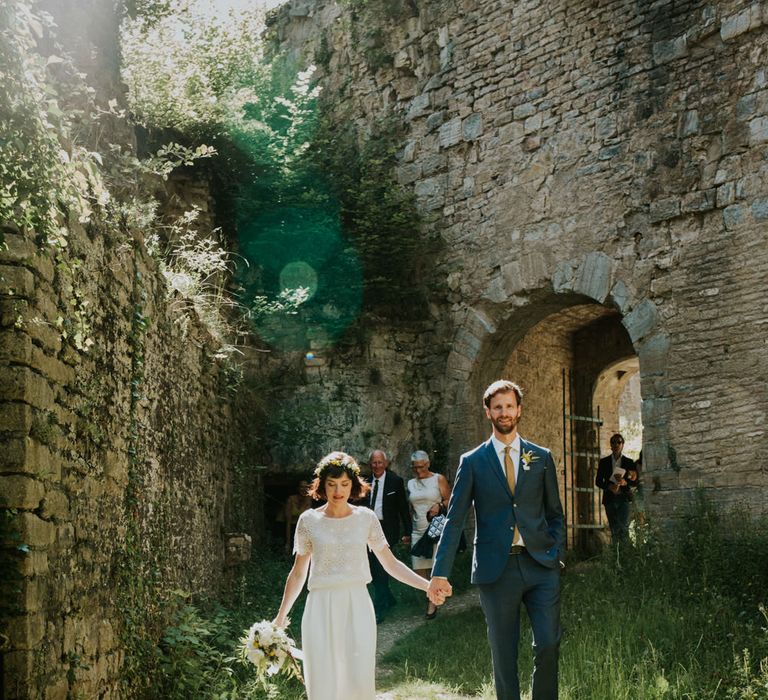 Boho Bride in Bespoke Lace Bridal Separates | Groom in Blue Suit | Chic Rustic French Wedding at Le Morimont Styled by Féelicité | Photography by Chloe