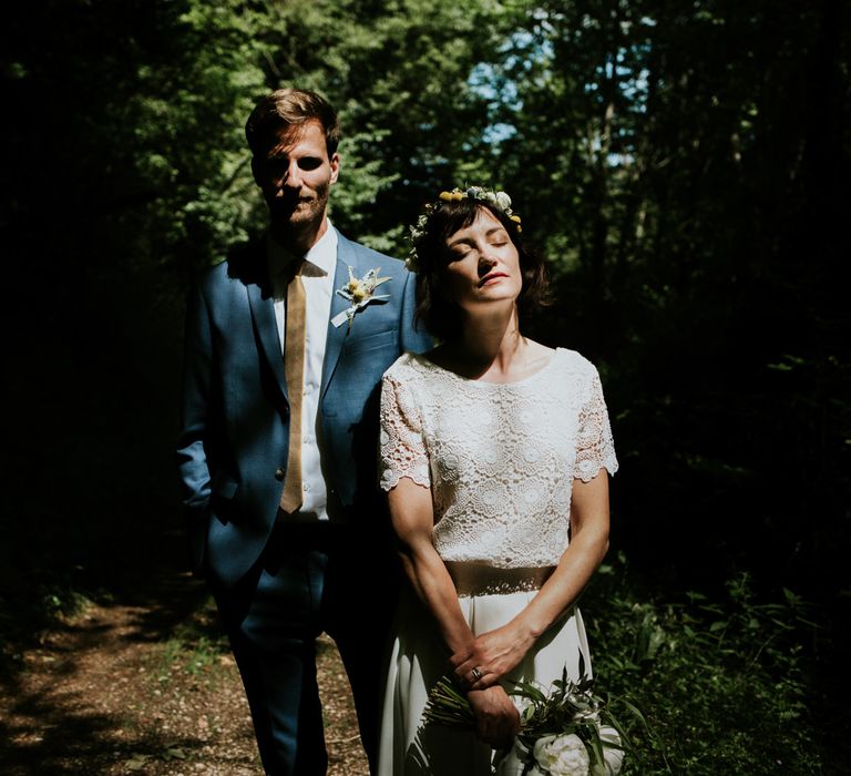 Boho Bride in Bespoke Lace Bridal Separates | Groom in Blue Suit | Chic Rustic French Wedding at Le Morimont Styled by Féelicité | Photography by Chloe