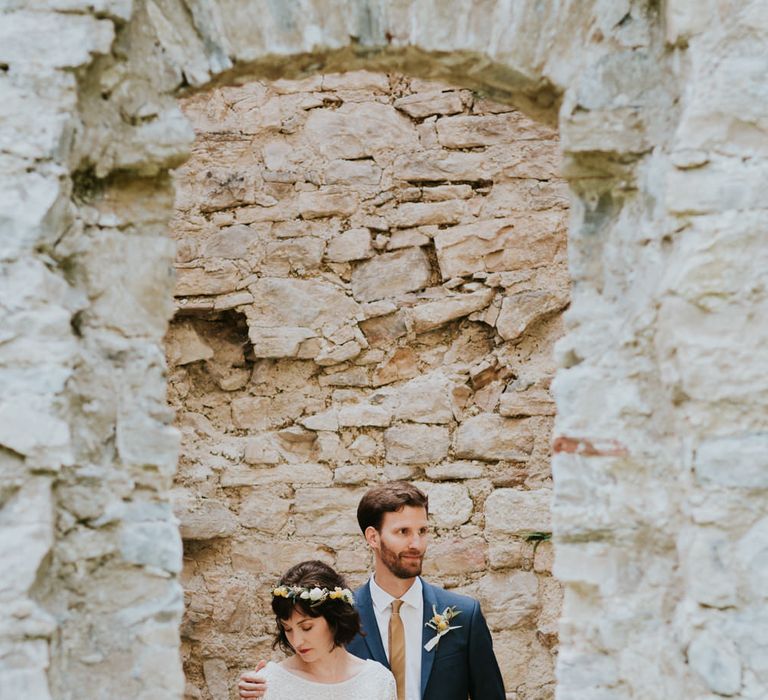 Boho Bride in Bespoke Lace Bridal Separates | Groom in Blue Suit | Chic Rustic French Wedding at Le Morimont Styled by Féelicité | Photography by Chloe