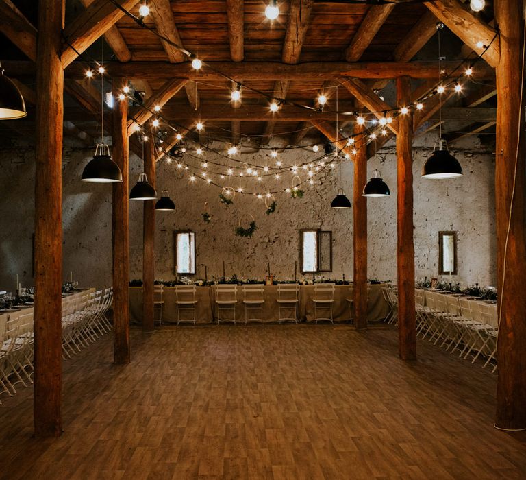 Festoon Light Dance Floor | Chic Rustic French Wedding at Le Morimont Styled by Féelicité | Photography by Chloe