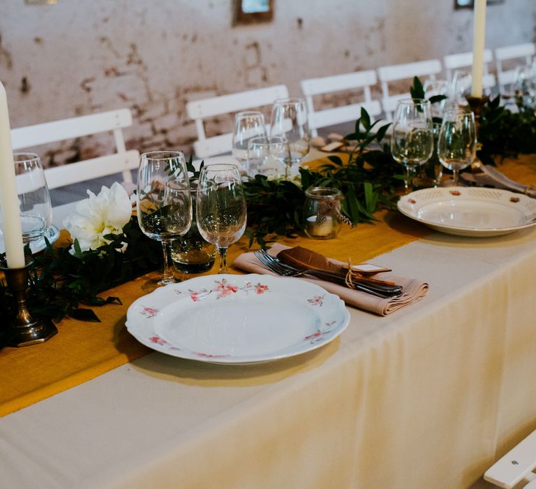 Vintage China | Greenery Table Runner | Tablescape Decor | Chic Rustic French Wedding at Le Morimont Styled by Féelicité | Photography by Chloe