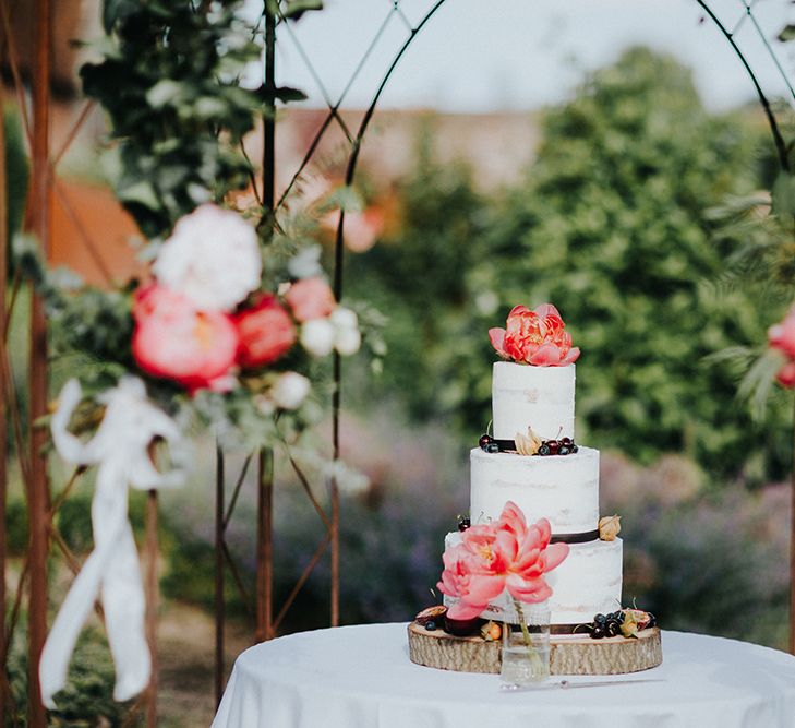 Wedding Cake Decorated with Coral Peonies