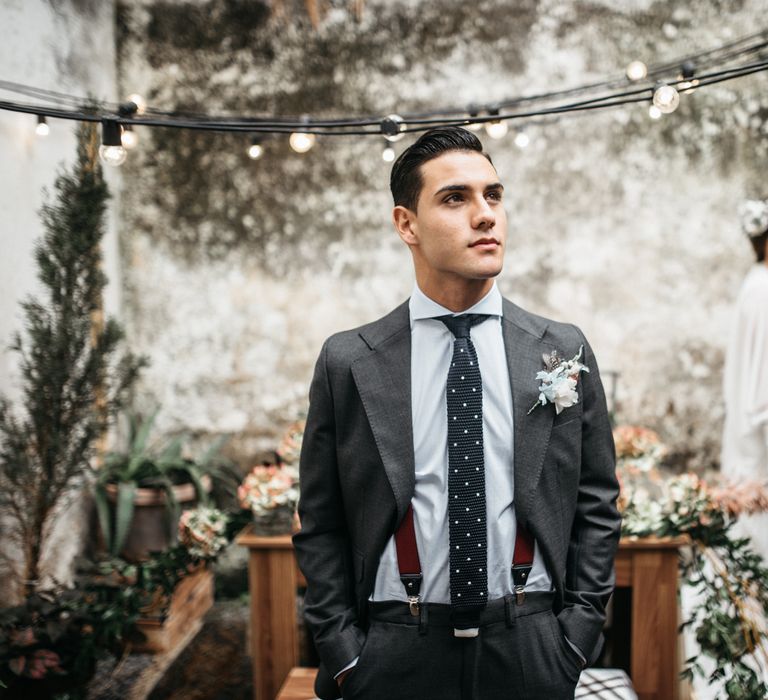 Groom in Braces with Polka Dot Tie