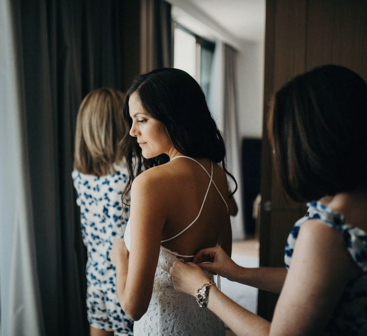 Bridal Preparations | Bridesmaid in White Lace Dress | Jere Satamo Photography