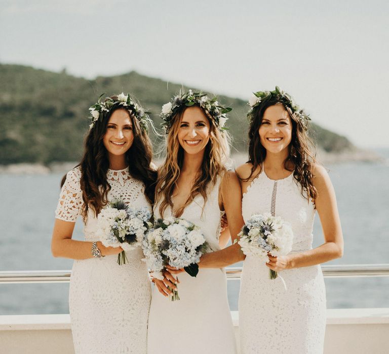 Bridesmaids in White Lace Dresses | Bride in Rime Arodaky Gown | Jere Satamo Photography