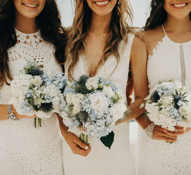 White & Blue Bouquets | Bridesmaids in White Lace Dresses | Bride in Rime Arodaky Gown | Jere Satamo Photography