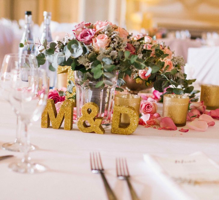 Floral Centrepieces with Gold Glitter Monogram Decor