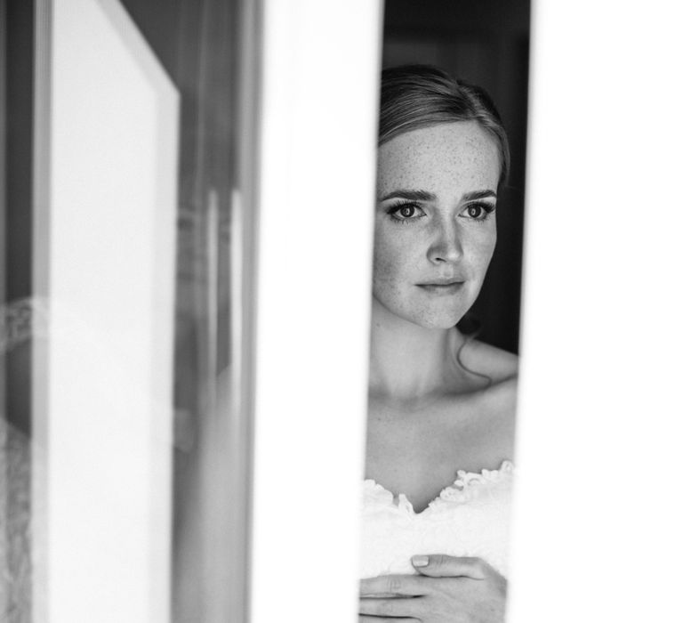 Bride in Strapless Lace San Patrick Wedding Dress Getting Ready