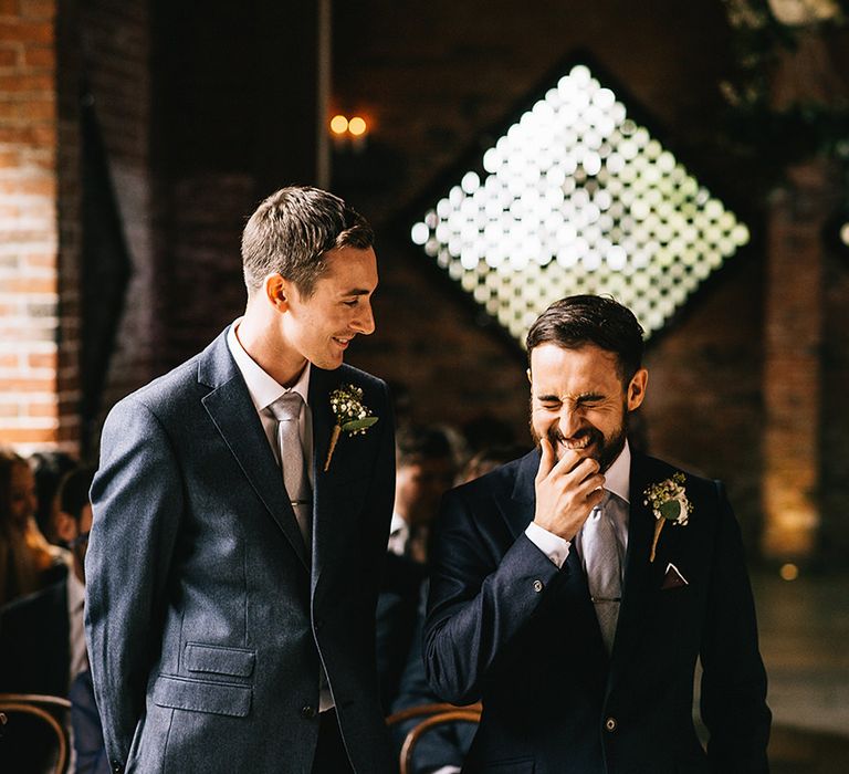 Groom in Reiss Bespoke Tailoring Suit at Shustoke Farm Barn Altar | Alex Tenters Photography