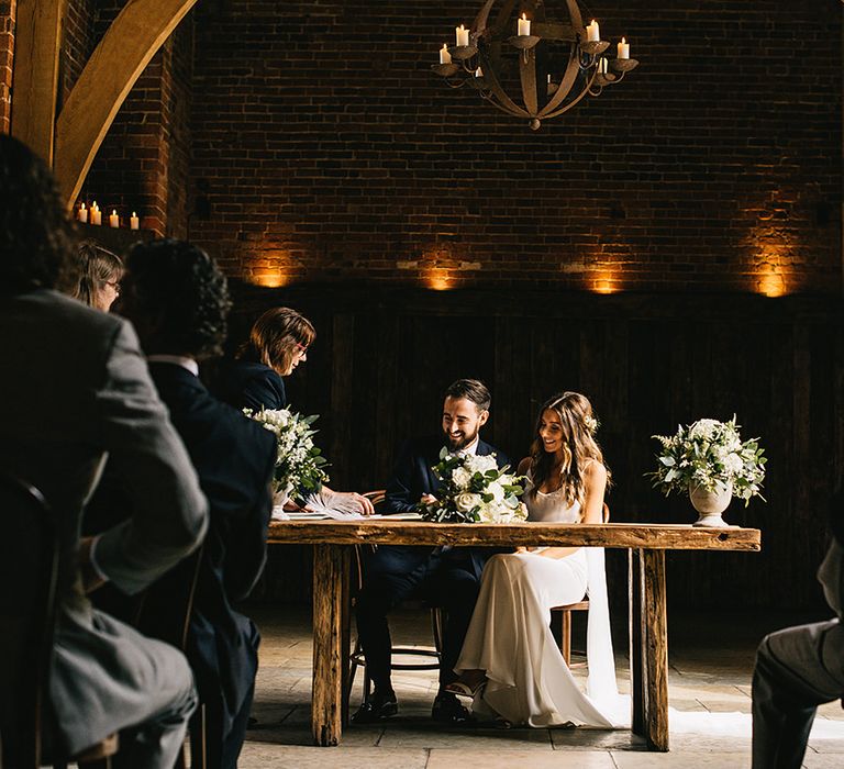 Shustoke Farm Barn Wedding Ceremony | Bride in Martina Liana Bridal Gown from Coco and Kate | Groom in Reiss Bespoke Tailoring Suit | Alex Tenters Photography