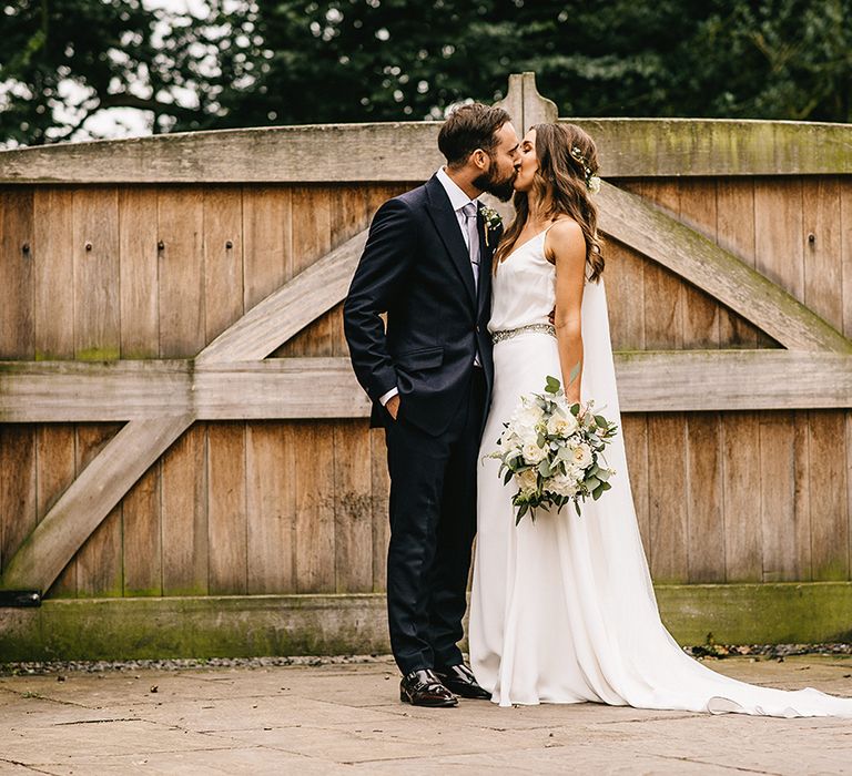 Bride in Martina Liana Bridal Gown from Coco and Kate | Groom in Reiss Bespoke Tailoring Suit | Alex Tenters Photography