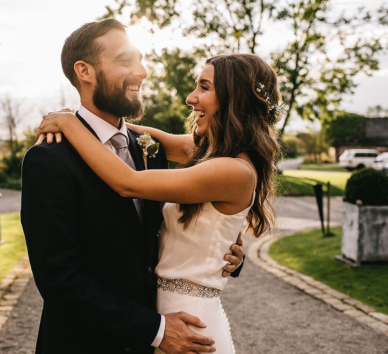 Bride in Martina Liana Bridal Gown from Coco and Kate | Groom in Reiss Bespoke Tailoring Suit | Alex Tenters Photography