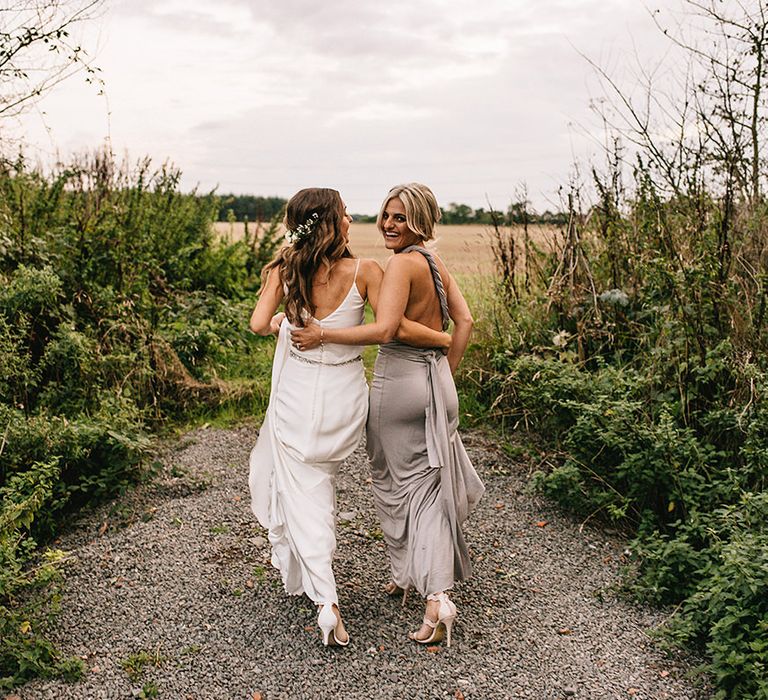 Bride in Martina Liana Bridal Gown from Coco and Kate | Bridesmaid in Grey ASOS Multiway Dress | Alex Tenters Photography