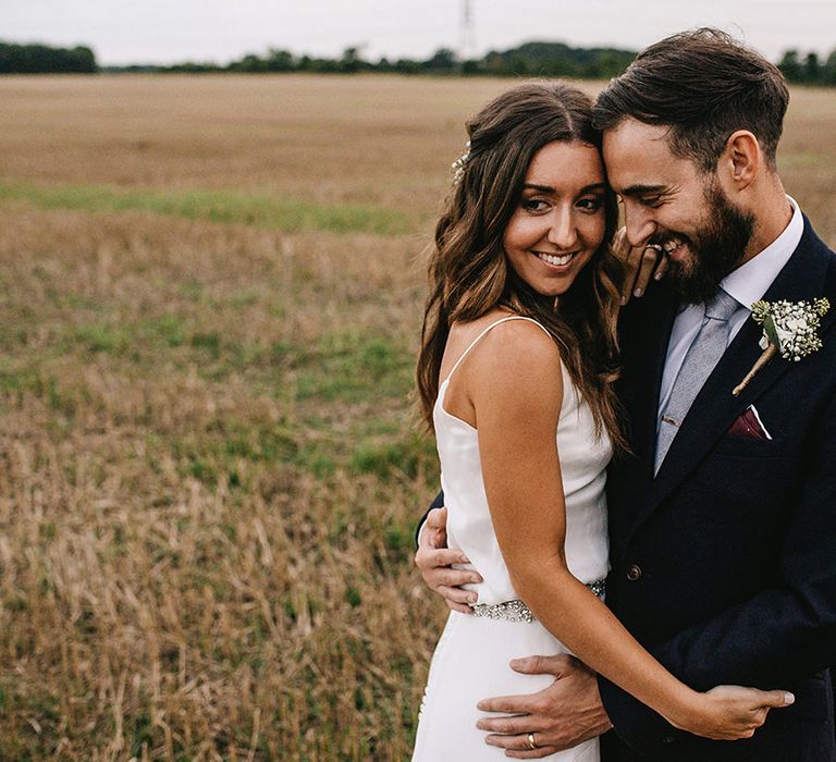 Bride in Martina Liana Bridal Gown from Coco and Kate | Groom in Reiss Bespoke Tailoring Suit | Alex Tenters Photography