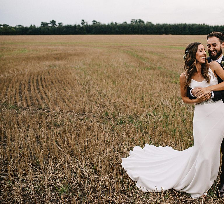 Bride in Martina Liana Bridal Gown from Coco and Kate | Groom in Reiss Bespoke Tailoring Suit | Alex Tenters Photography