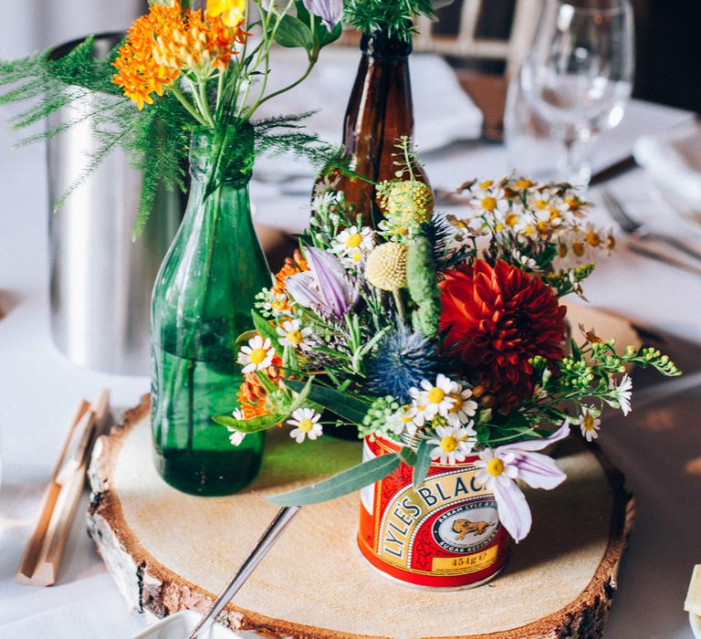 Rustic Tree Slice Centrepiece with Flower Stems in Jars & Vases