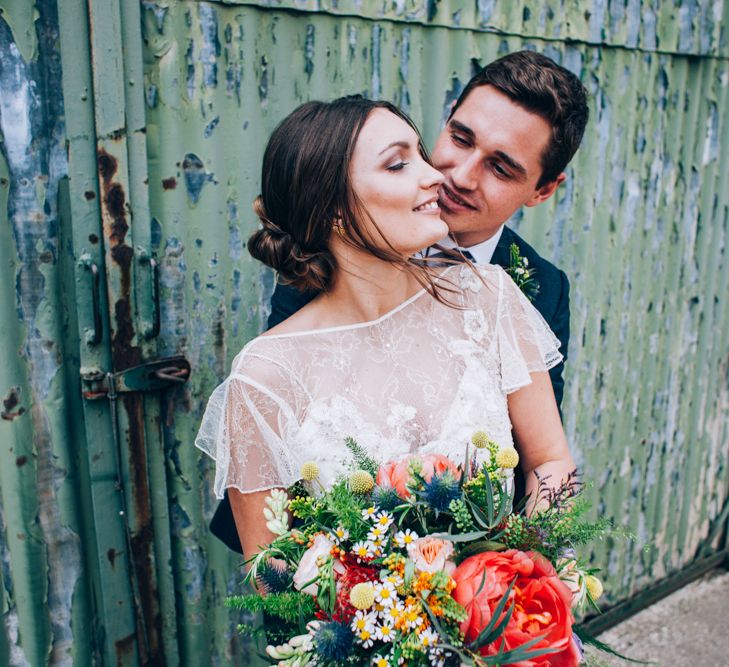 Bride in David Fielden Wedding Dress & Groom in Reiss Suit