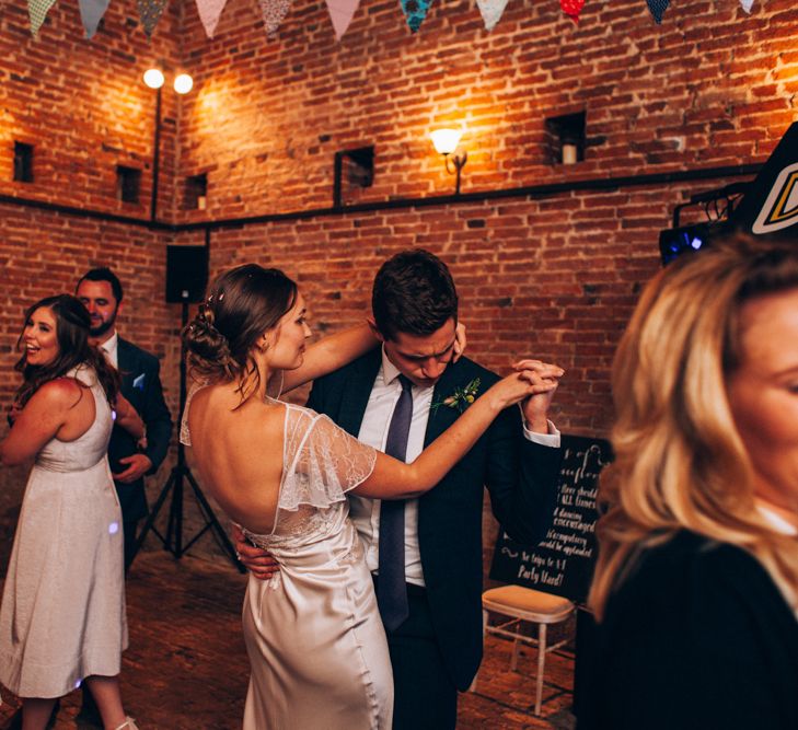 Evening Reception with Bride in David Fielden Wedding Dress & Groom in Reiss Suit