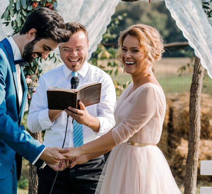 Outdoor Wedding Ceremony with Bride in Bespoke Pink Tulle Gown & Groom in Vitale Barberis Canonico Suit