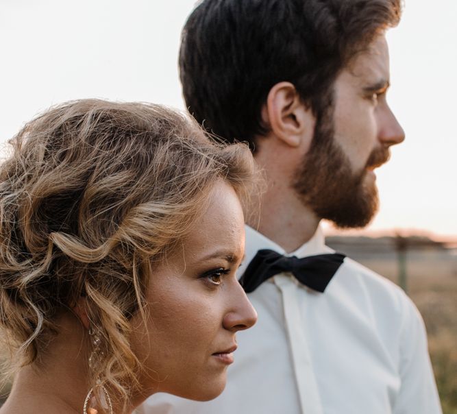 Bride in Bespoke Pink Tulle Gown & Groom in Vitale Barberis Canonico Suit