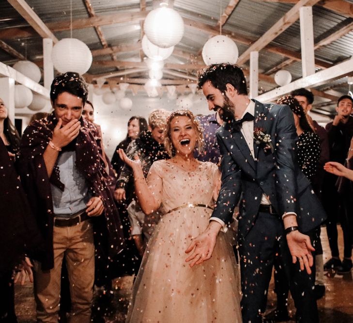 Confetti Moment with Bride in Bespoke Pink Tulle Gown & Groom in Vitale Barberis Canonico Suit