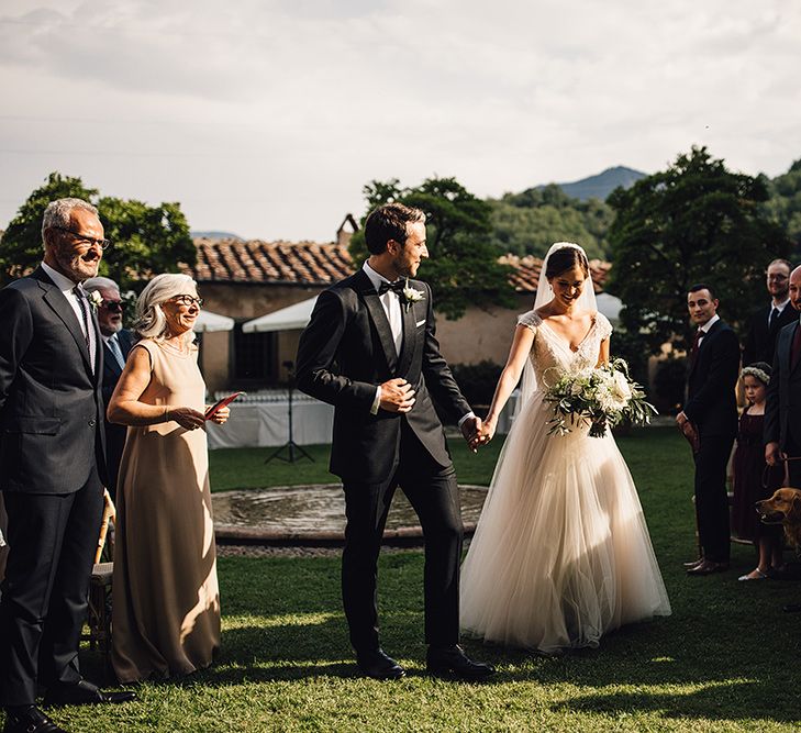 Bride in Customised David Fielden Wedding Dress and Groom in Cad & The Dandy Suit