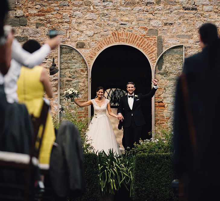 Bride in Customised David Fielden Wedding Dress and Groom in Cad & The Dandy Suit