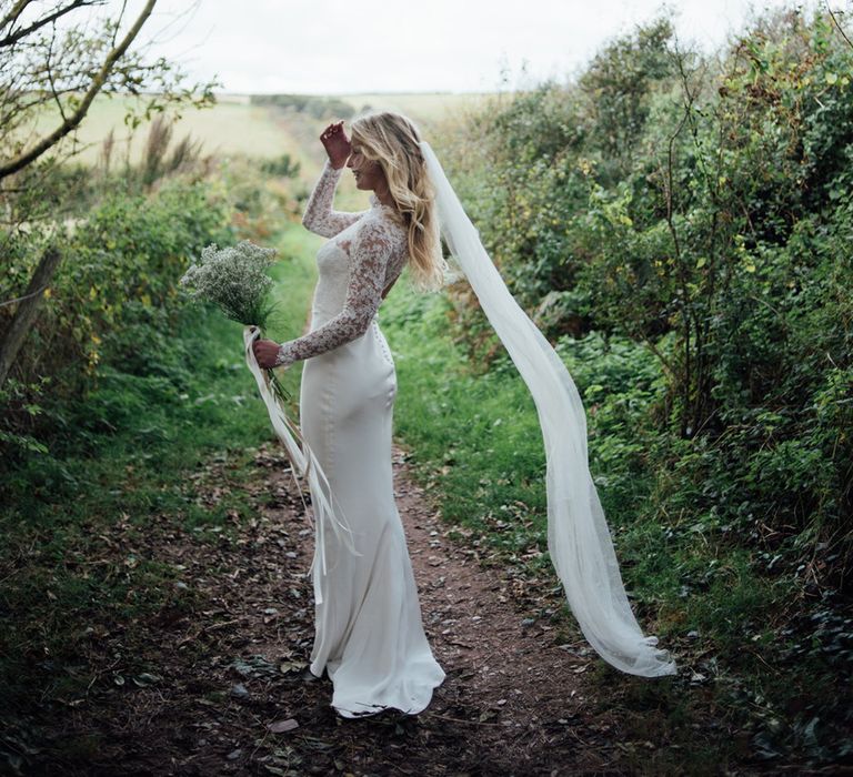 Bride In Bespoke Dress With Lace Long Sleeves & Deep V Back