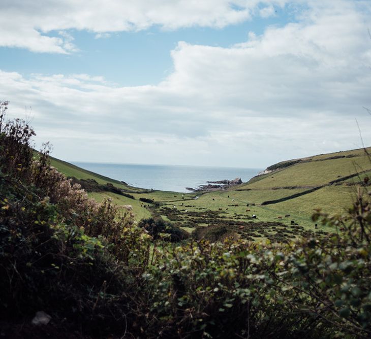 Intimate Beach Elopement In Devon With Bride In Bespoke Dress & Images By Liberty Pearl Photography