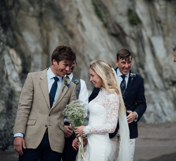 Intimate Beach Elopement In Devon With Bride In Bespoke Dress & Images By Liberty Pearl Photography