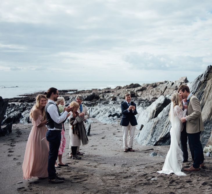 Intimate Beach Elopement In Devon With Bride In Bespoke Dress & Images By Liberty Pearl Photography